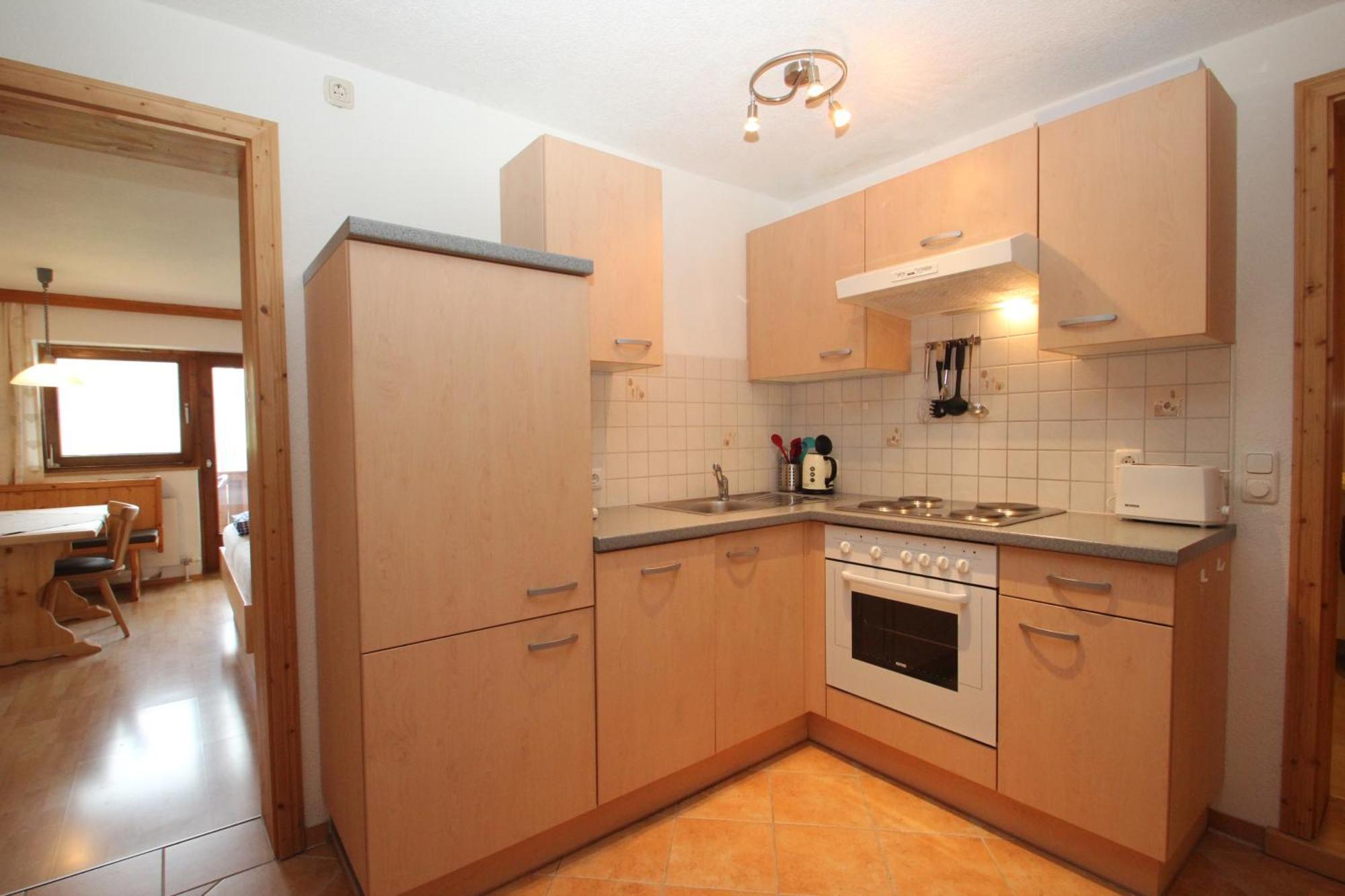 Siedlerhof Apartman Hopfgarten im Brixental Szoba fotó